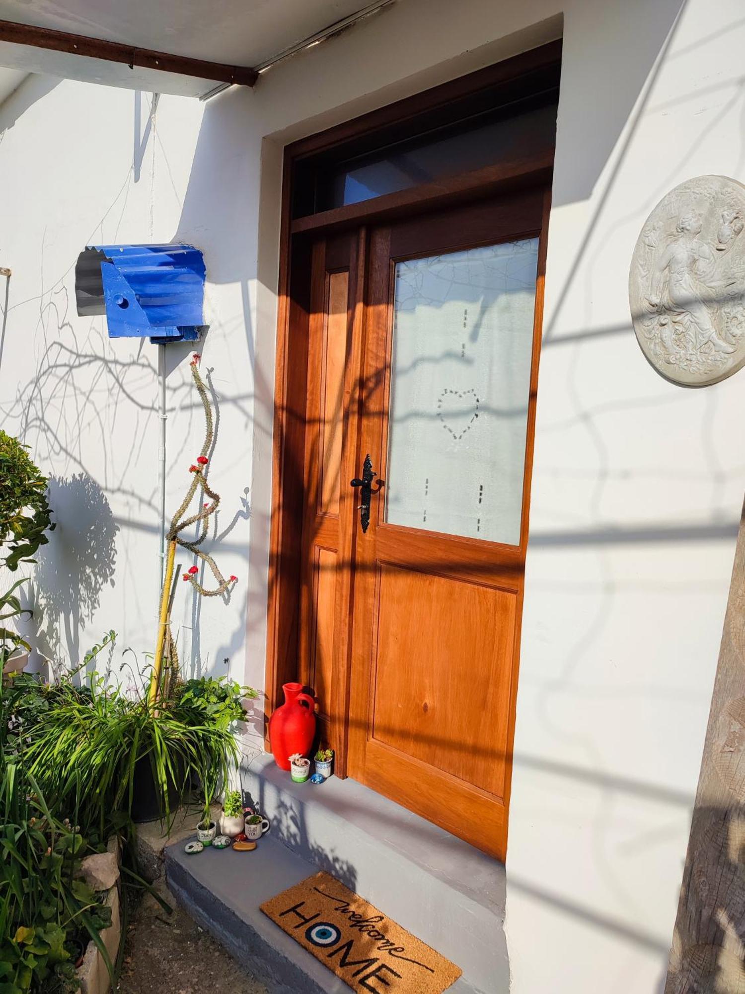 Faith'S Stone House Guest House Simou Bagian luar foto