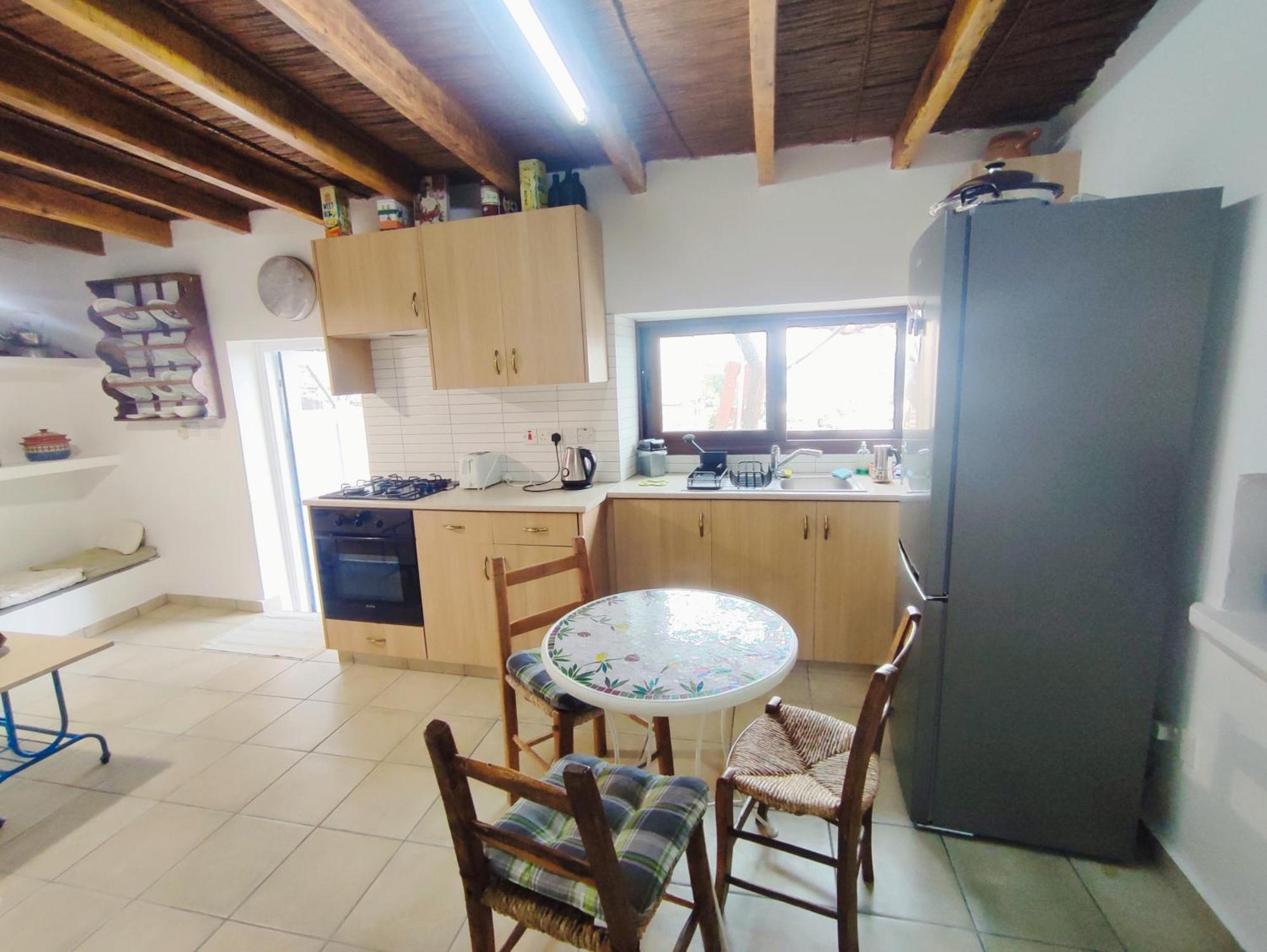 Faith'S Stone House Guest House Simou Bagian luar foto