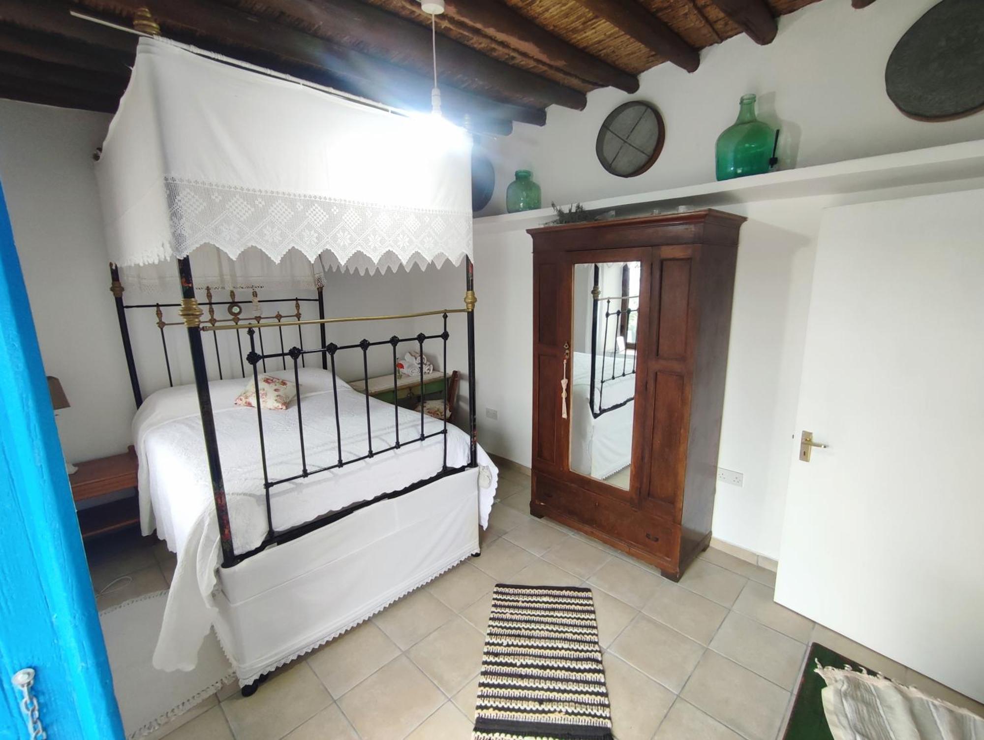 Faith'S Stone House Guest House Simou Bagian luar foto