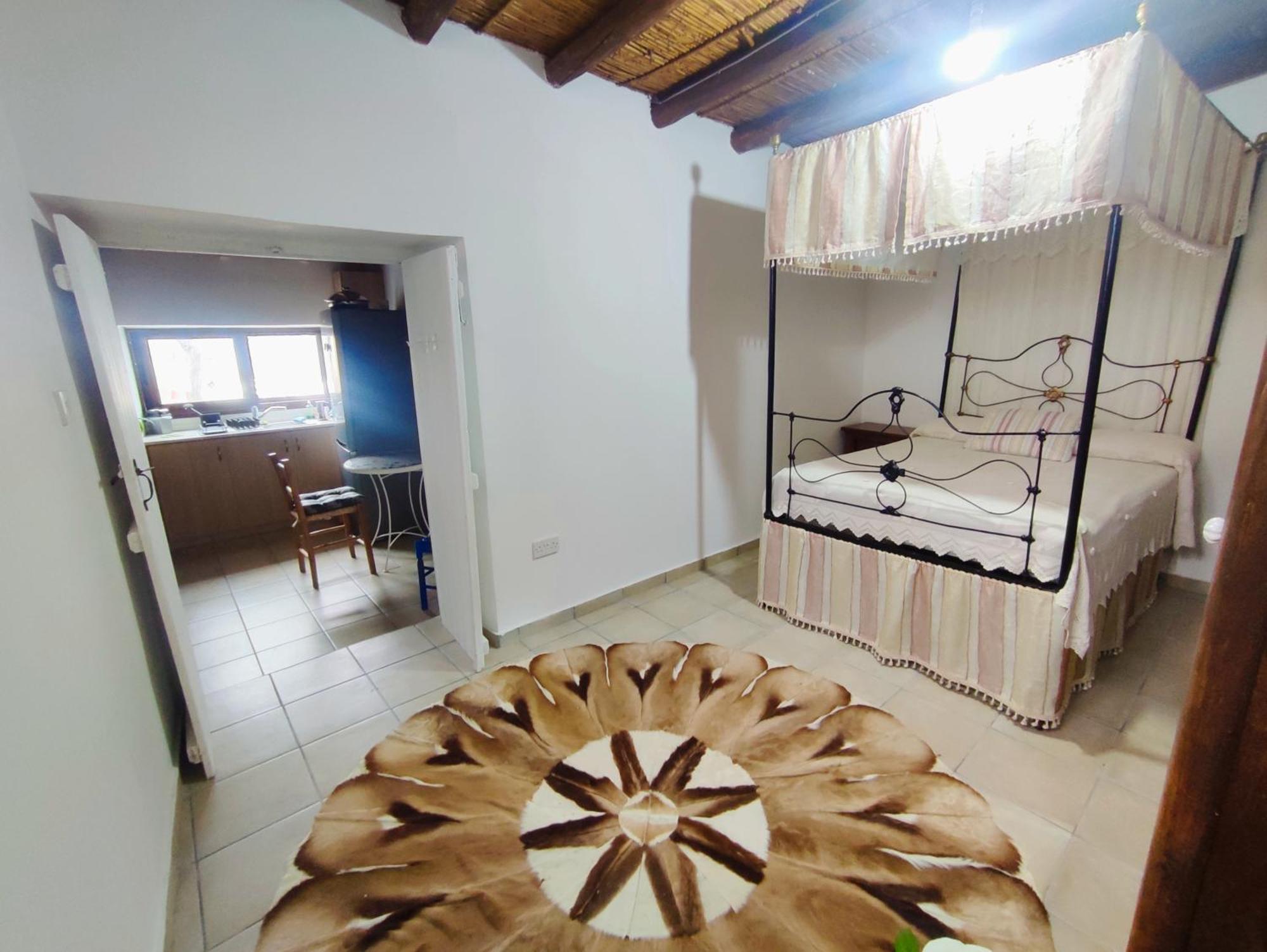 Faith'S Stone House Guest House Simou Bagian luar foto
